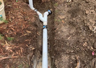 Replacing pipes that were blocken from tree roots and blockage