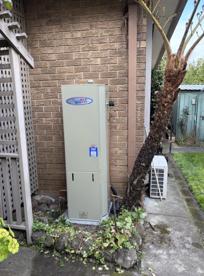 Old and new Aquamax gas hot water systems during a replacement in Heathmont after the original unit provided 28 years of service.