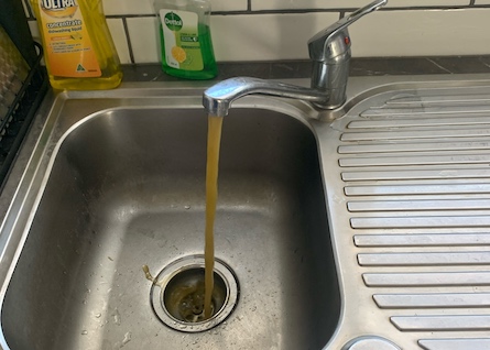 Before water pipe replacement - Ringwood Brown, discoloured water from a tap before water pipe replacement in Ringwood