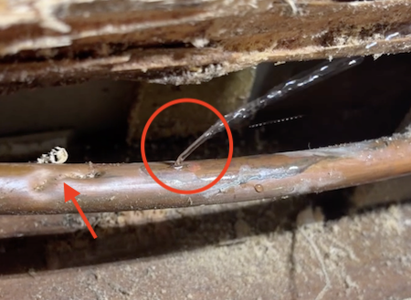 burst-copper-pipe-templestowe Leaking copper pipe in Templestowe with the leak circled and an arrow pointing to other weakened sections