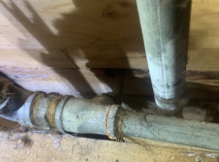 Old Galvanised Pipework in Ringwood Old galvanised water pipework at a home in Ringwood
