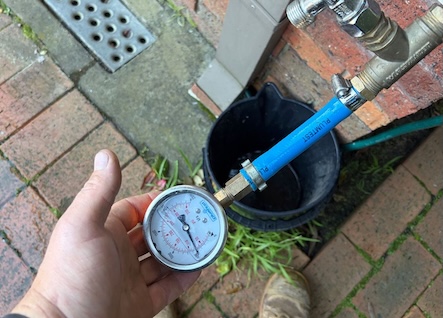 Testing Water Pressure in Templestowe H2PRO plumber testing water pressure at a home in Templestowe